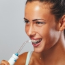 Comparing water flosser and dental floss effectiveness